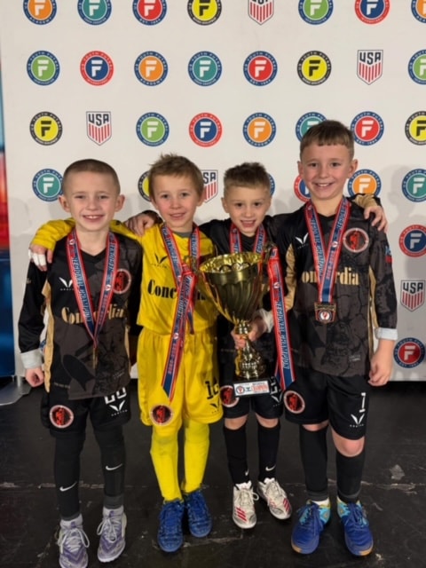 Juniors team with championship trophy